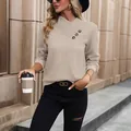 Women's apricot long sleeve textured V-neck sweatshirt with decorative buttons - S / Apricot