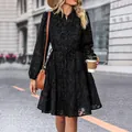 Elegant black long sleeve mini dress with floral jacquard texture and drawstring waist - S / Black