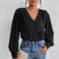 Women's black V-neck chiffon jumpsuit with long sleeves and pleated shoulders - S / Black