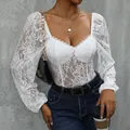 White floral lace bodysuit with sweetheart neckline and slimming long sleeves - White