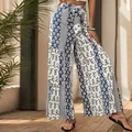 High-waist wide-leg bohemian pants with blue and white floral print and bow tie belt - S / Blue