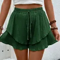 Donkergroene gelaagde short met hoge taille, elastisch trekkoord en een volant zoom voor dames - Donkergroen