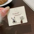 Orecchini asimmetrici a forma di orsetto d'argento con tazza di caffè e chicco - KFT3 Tazza Caffè Orso
