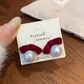 Red flocked velvet bow earrings with large white pearls on a display card - Red Bowknot Pearl (ZZW5)