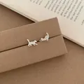 Minimalist cat stud earrings in brushed silver finish featuring playful feline poses - Silver Brushed Cat Earrings