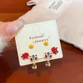 Three-pair Chinese New Year earring set with red Xi character and dancing lion charms - LIN2 Small Lion Dance Bell Set