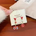 Asymmetric Chinese Lion Dance earrings with red hearts and lucky charms - LIN6 Red Lion Dance Wealth Earrings