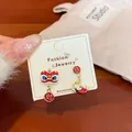 Asymmetric red lion and koi earrings with lucky characters in gold finish - LIN11 Lion Dance Abundance Fish