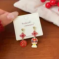 Asymmetric Chinese New Year earrings with red Chinese knot and lion dance charm - XST4 Lion Dance Chinese Knot