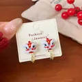 Festive Chinese style lion dance stud earrings with red white finish and gold bells - XST1 Plush Lion Dance Bell
