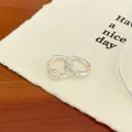 Elegant silver earrings with oval opal stones and minimalist zircon inlay design - Moonstone Style Ear Buckle