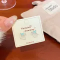 Elegant silver butterfly stud earrings with light blue enamel and cat eye stone - Bowknot Round Bead Stud Style (HDM1)