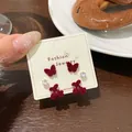 Three-pair red velvet heart and butterfly stud earring set on display card - 3 Pairs Set / HSR08 Zirconia Cherry Butterfly Style