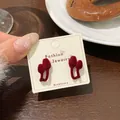 Deep burgundy flocked cherry style stud earrings on a fashion jewelry display card - HSR05 Red Flocked Tulip