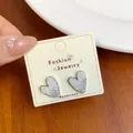 Elegant heart-shaped crystal stud earrings with silver frame on jewelry card - Heart / Fog Blue Crystal Heart