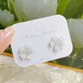 Elegant 925 silver post earrings featuring transparent 5-petal resin flowers on card - Crystal Pentagonal Flower