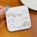 7-Tage Schmetterling Ohrstecker Set in Rosa und Silber mit Perlen und funkelndem Zirkon - Rosa Schmetterling Set