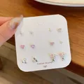 Set silberner Ohrstecker mit rosa Herzsteinen, Koala und Schmetterlingsanhängern - Rosa Bär Set