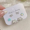 5-piece silver kitten stud earring set with moon, star, and bow designs for women - Transparent Cat Combination