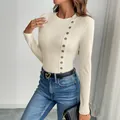 Slim fit cream rib-knit bodysuit with decorative buttons and long sleeves for women - S / Apricot