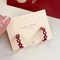 Red enamel C-shape hoop earrings with square zircon stones on display card - Red Hoop with Square Zirconia (LF21)