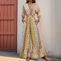 Bohemian jumpsuit met bloemenprint in geel en rood, hoge taille en wijde pijp ontwerp - S / Geel