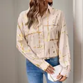 Chemisier beige à manches longues avec imprimé doré métallisé et boutons blancs - S / Kaki
