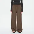 Bruine wijde broek voor dames van katoen en linnen met elastische tailleband - S / Bruin