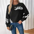 Women's black crewneck sweatshirt with white heart towel embroidery on sleeves and chest - S / Black