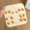 Set di 7 paia di orecchini a perno a forma di ciambella su cartoncino bianco - Set di Pane da 7 Pezzi (BR01)