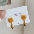 Orecchini a gatto arancione carini con coda a strisce pendente per le donne - Coda di Gatto (BR09)