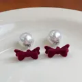 Elegant pearl earrings with burgundy velvet bows and silver pins for a vintage look - Woven Bow With Pearls
