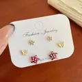 Three pairs of mini 925 silver post earrings including gold flowers and red bow stars - Red Star Polka Dot (BN2)