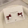 Elegant dark red velvet bow earrings with pearls and teardrop crystals in gold finish - Left And Right Pendant Pearl (RV22)