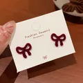 Elegant wine red velvet bow stud earrings with a soft texture and silver pin design - Crescent Bowknot (RV32)