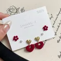 Set of three velvet earrings including red flowers, pearls, and heart drops on card - Red Heart Bow Pearl Earrings (PA19)