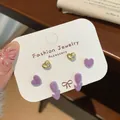 Three-pair earring set featuring purple flocked hearts and tulip designs with gold finish - Purple Tulip