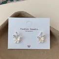 Elegante Schmetterlingsohrringe in Silber mit Perlmutteffekt und funkelnden Zirkonia - Rosa Doppelter Schmetterling (HDW018)