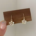 Pink cherry blossom earrings with enamel petals and a small central white pearl - Cherry Blossom Ear Hook (YF8)