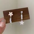 Pink cherry blossom asymmetric earrings with pearls and silver finish in hand - Cherry Blossom Beaded Earring (SQ6)