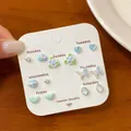 7-day floral stud earring set with mini pearls and stars on a weekly paper card - Spring Blue Butterfly Style (HHE008)