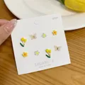 Set of four yellow tulip and floral S925 silver stud earrings on a display card - Yellow (YJX2)