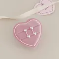 Silver double heart stud earrings with long metal bar in pink velvet jewelry box - Layered Hearts