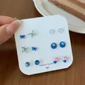 6-pair cute stud earring set with blue bow, butterfly and floral resin designs - Blue Tulip Style (AXL7)