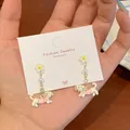 Cute white enamel dachshund dog earrings with colorful polka dots and daisy detail - Pink Flower Dachshund Drop Style