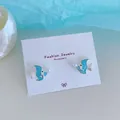 Blue tropical fish stud earrings with pearls and enamel finish on display card - Pearl Salmon Fish