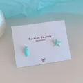 Orecchini asimmetrici a stella marina e conchiglia blu con finitura argento e cristalli - Stella Marina e Conchiglia Blu