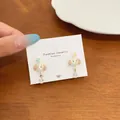 Cute polka dot dachshund dog earrings with light blue flower and crystal teardrop charm - Zirconia Flower Dachshund Drop Style