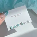 Blue ocean themed earring set with starfish, whale tail and pearl stud designs - Blue Starfish Fish Tail Sets
