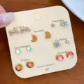 Brown tortoiseshell weekly stud earrings set featuring cute bear and croissant designs - Croissant Crescent Style